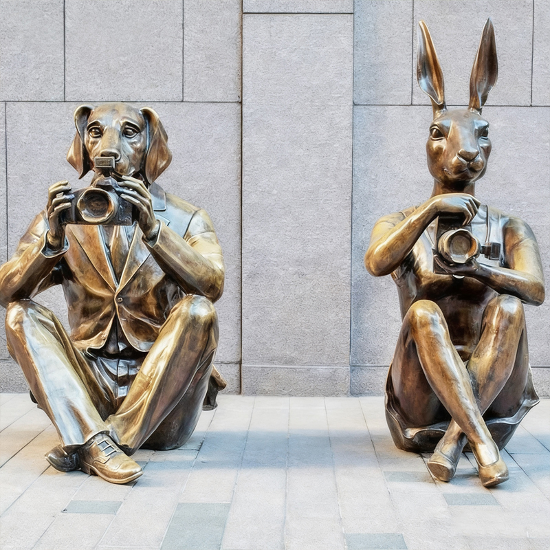 Skulptur zum Thema „Tierfotograf“.